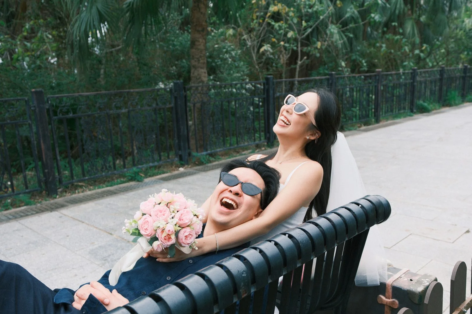 Laughing on a bench